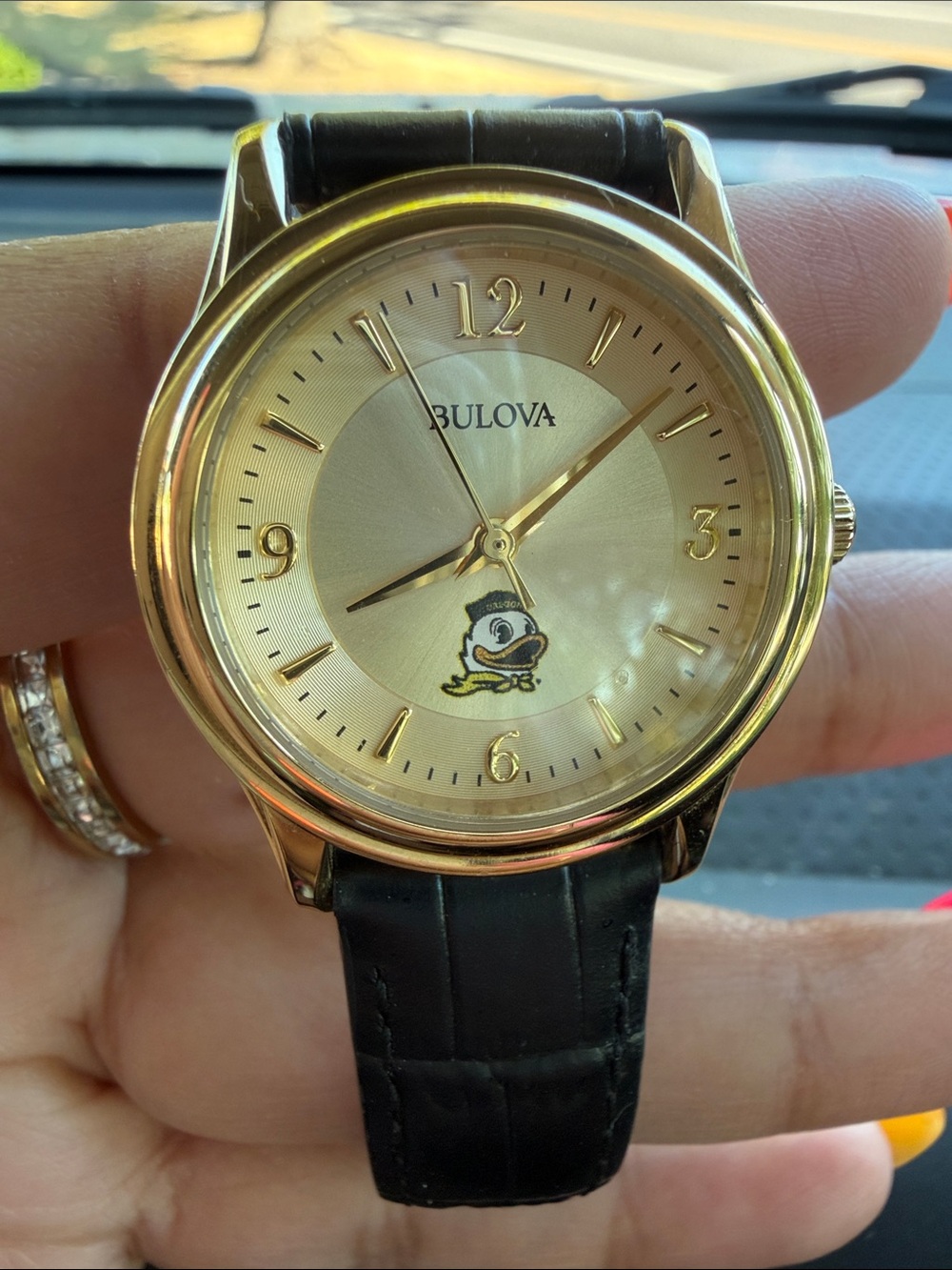 Oregon Duck Bulova Gold Tone Watch with Black Strap